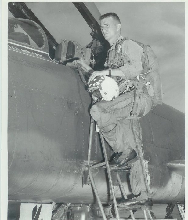 Johnson climbing into plane