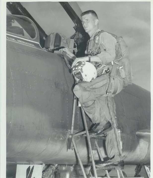 Johnson climbing into plane 