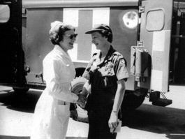 Navy nurses shake hands