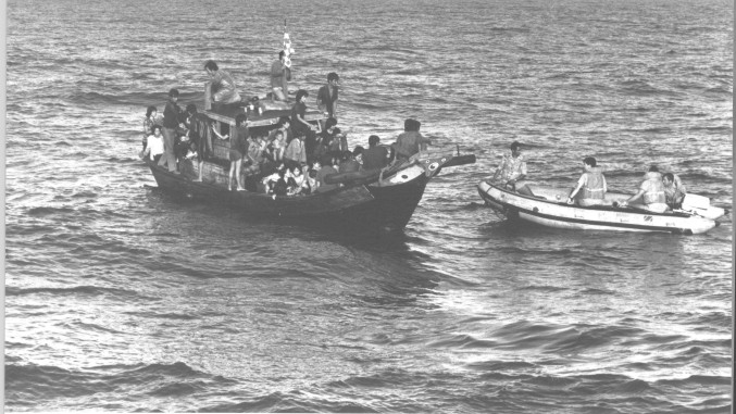 Adrift at sea, these refugees were saved in time.: Douglas Pike Photograph Collection [VA001624]